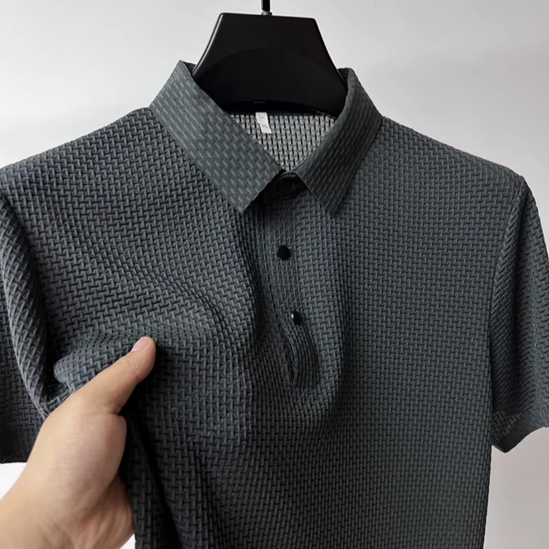 A Camisa Polo Alfa Classic combina um design atemporal com a máxima qualidade em tecido, garantindo elegância e conforto em todas as ocasiões. Seu corte impecável e acabamento premium fazem dela a escolha ideal para quem busca sofisticação no dia a dia.